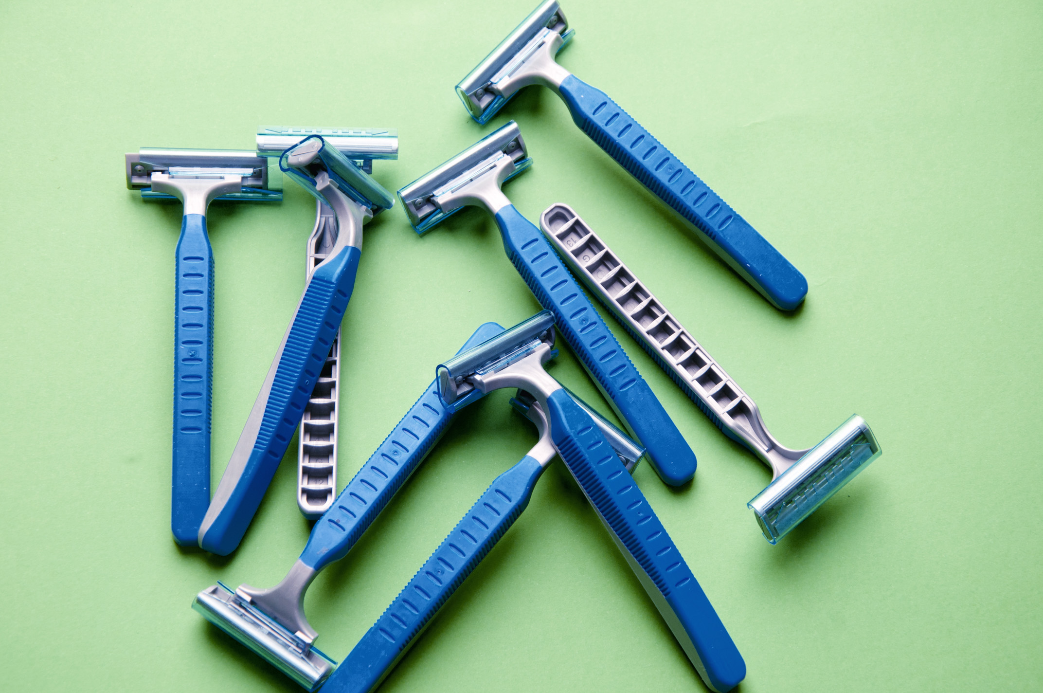 Blue shaving razors displayed.