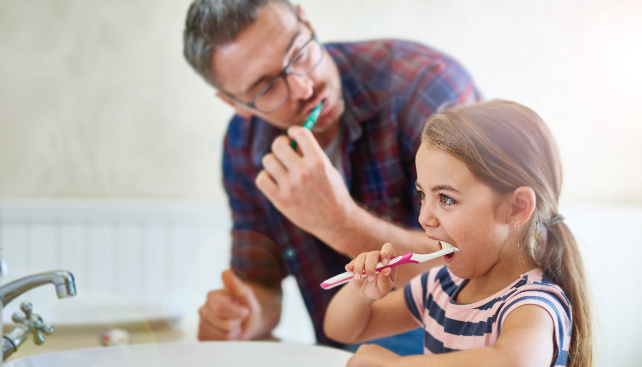 girl brushing teeth